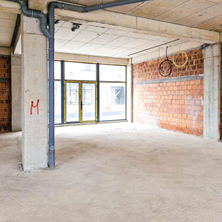 a room with brick walls and a window